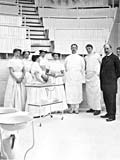 Group of nurses and doctors in operating theatre. (photo ca. 1910). MUA PR026162.