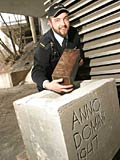 Sergeant Mathieu Racette of McGill Campus Security with time capsule. Photo by Owen Egan/McGill Reporter.