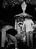 Candid Old McGill Moment: McGill Students "digging" up James McGill's tomb. Old McGill, 1950.
