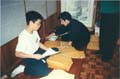 Montreal Bulletin volunteers: Kano Futamura and son.