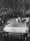 Students, staff, and dignitaries on hand for the placing of the Donner Building for Medical Research time capsule inside its cornerstone. Old McGill 1947.