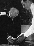 Chancellor O.S. Tyndale placing the time capsule inside the Donner Building for Medical Research cornerstone. Old McGill 1947.