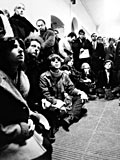 Students watching television debate between Principal H. Rocke Robertson, Dean of Arts H. Wood, and Stanley Gray. (photo 1969). MUA PR000407.